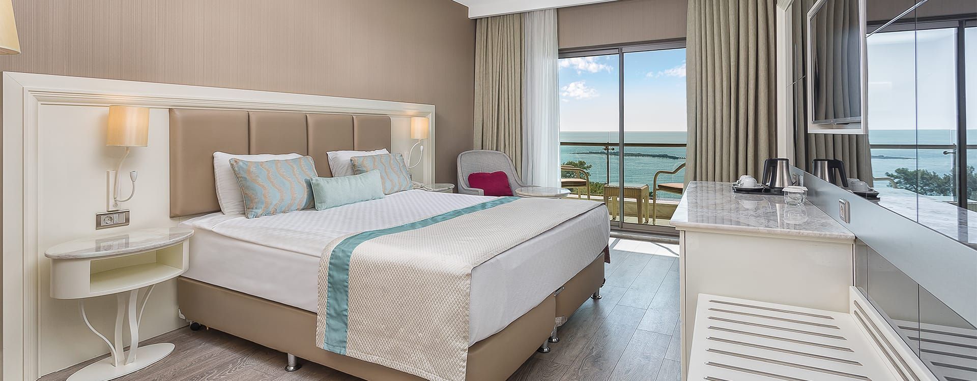 Family Room (Sea View) at Light Upon Light: Türkiye 2027 - SEA VIEW FAMILY ROOM WITH SEPARATE CHILDREN’S ROOM — SLEEPS FIVE